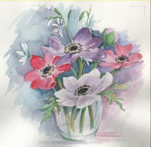 purple white red pink flowers in vase blue and white background